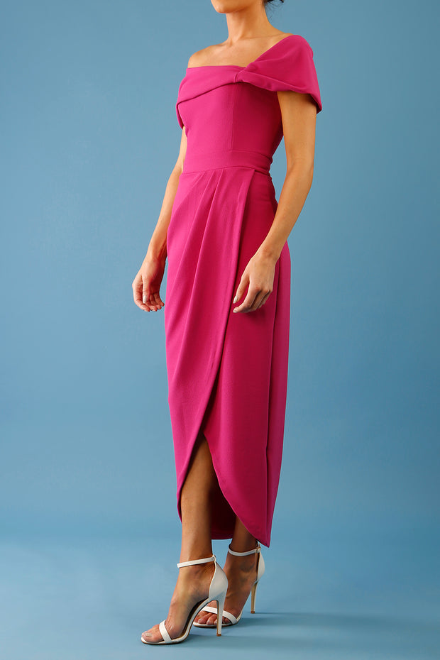 brunette model is wearing the diva catwalk vegas midaxi calf length dress off shoulder in magenta side
