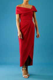 brunette model is wearing the diva catwalk vegas midaxi calf length dress off shoulder in red side