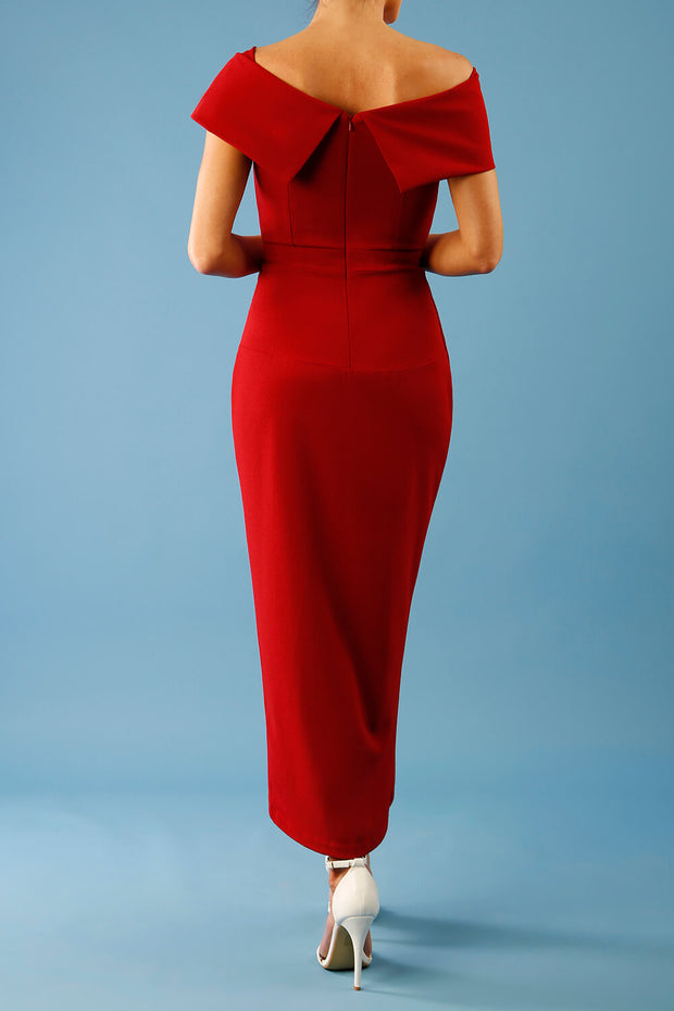 brunette model is wearing the diva catwalk vegas midaxi calf length dress off shoulder in rosewood red back