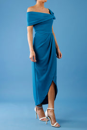 brunette model is wearing the diva catwalk vegas midaxi calf length dress off shoulder in tropical teal side