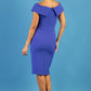 brunette model wearing diva catwalk evening pencil skirt dress sleeveless with lowered neckline and pleating on side in indigo blue colour back