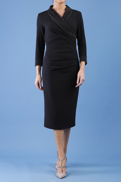 model is wearing diva catwalk osaka black pencil dress with sparkle contrasting detail on sleeves and v-neckline front