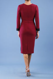 model is wearing diva catwalk bounty contrast pencil dress with rounded neckline and waistband in blissful burgundy and black colours back
