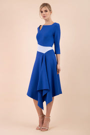 Blonde Model wearing Diva Catwalk Pinto Contrast Swing Dress with asymmetric skirt and asymmetric neckline with three quarter sleeve in Cobalt Blue front