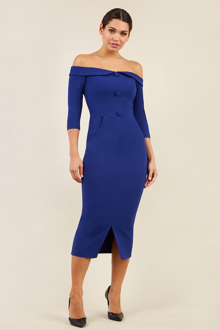 brunette model wearing diva catwalk zorita maxi pencil three quarter fitted dress off-shoulder with bardot neckline and buttons to front with pockets and vent on a skirt in oxford blue front