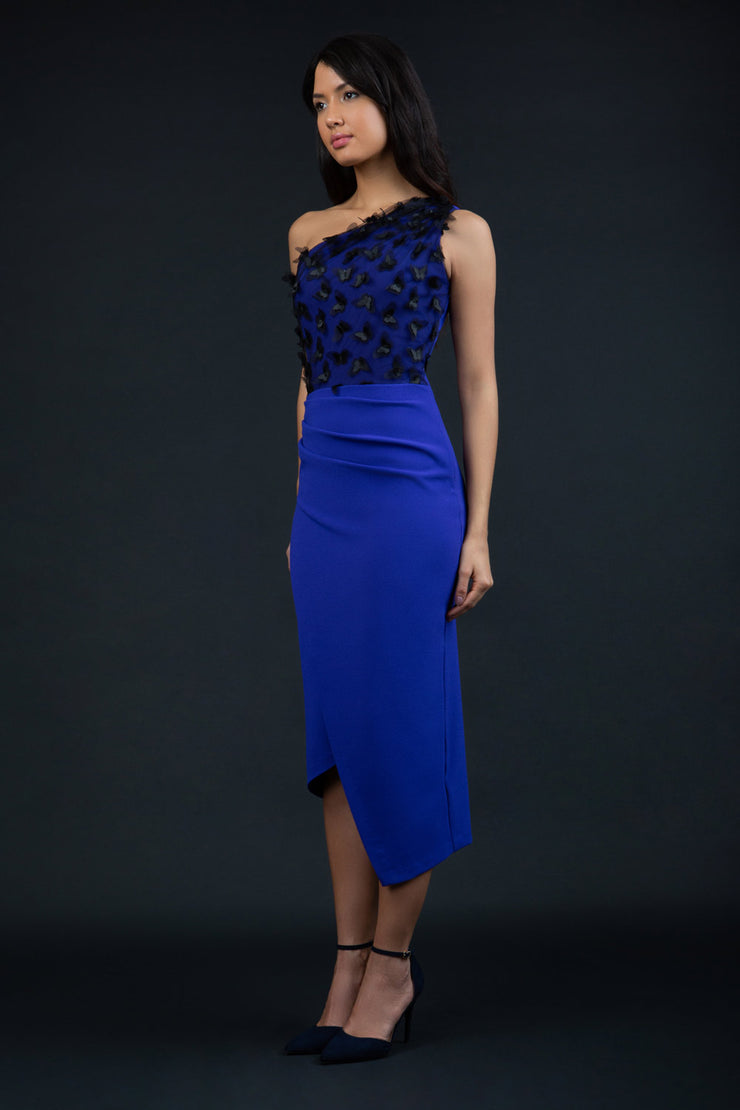 Model wearing the Diva Winslow dress in asymmetric design, one shoulder in spectrum indigo colour front image
