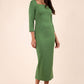 brunette model wearing diva catwalk maxi plain three quarter sleeve dress with pleating on shoulders and square neckline in vineyard green front