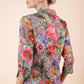 Model is wearing the Diva Branscombe 3/4 Sleeve blouse in floral print taupe back image 