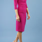 model wearing Diva Catwalk pencil three quarter sleeve dress with a split neckline and pleating across the tummy in magenta haze front
