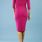 model wearing Diva Catwalk pencil three quarter sleeve dress with a split neckline and pleating across the tummy in magenta haze back