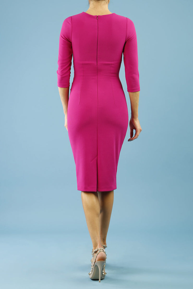 model wearing Diva Catwalk pencil three quarter sleeve dress with a split neckline and pleating across the tummy in magenta haze back