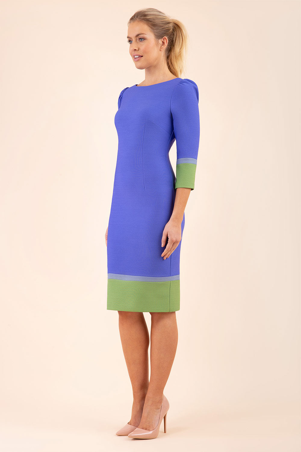 Model wearing the Diva Provence pencil dress design in Thistle blue, citrus green and sky grey colour blocking front image