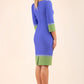 blonde Model wearing seed Provence pencil dress design in Thistle blue, citrus green and sky grey colour blocking back