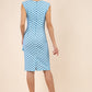 Brunette model wearing Diva Catwalk Perry Polka Dot Pencil Sleeveless Dress with tie detail on a side and rounded neckline in sky blue back
