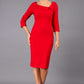 Model wearing Diva catwalk Opulus pencil dress in cardinal red with three quarter sleeve figure fitted front image