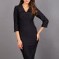 Model wearing Diva catwalk Pieris pencil dress in black with three quarter sleeve figure fitted front image