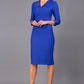 Model wearing Diva catwalk Pieris pencil dress in monaco blue with three quarter sleeve figure fitted front image