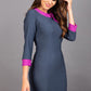 Model wearing Diva catwalk Branwen pencil figure fitted dress in slate grey with three quarter sleeve and dawn purple contrast detail front image