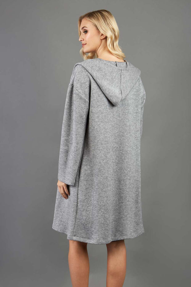 blonde model wearing diva catwalk hooded coat with long sleeves in soft cosy cashmere in grey back