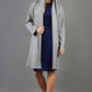blonde model wearing diva catwalk hooded coat with long sleeves in soft cosy cashmere in grey front