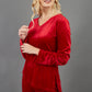blonde model wearing diva catwalk dahlia asymmetric velvet top with sleeves in red front