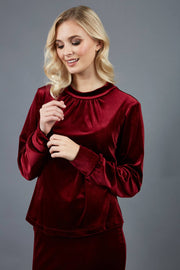 blonde model is wearing diva catwalk allium velvet sleeved high neck top in colour burgundy front