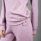 Model is wearing diva catwalk brody cashmere trousers long leg in lavender pink colour front paired with diva pink top