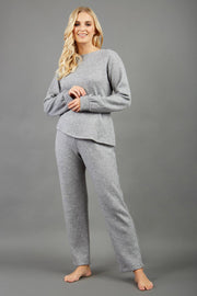 Model is wearing diva catwalk brody cashmere trousers long leg in flint grey colour front paired with diva long sleeve grey top