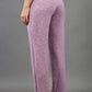 Model is wearing diva catwalk brody cashmere trousers long leg in pink colour back