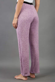 Model is wearing diva catwalk brody cashmere trousers long leg in pink colour back
