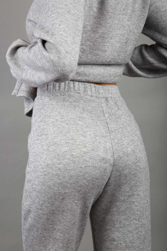 model wearing diva catwalk cosy soft touch cashmere joggers long leg with ribbon detail in flint grey back