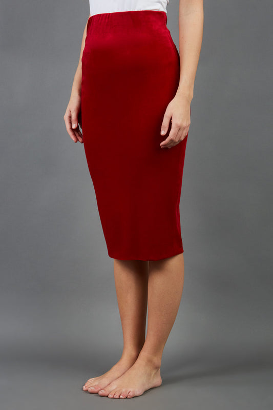model is wearing diva catwalk triste velvet pencil skirt in red front