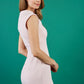 model wearing diva catwalk desdemona pencil plain dress with diamond shape neckline in pale pink colour side
