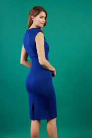 model wearing diva catwalk desdemona pencil plain dress with diamond shape neckline in cobalt blue colour back
