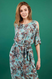 model is wearing diva catwalk maxi summer dress with short sleeve and a belt detail in pale blue print front