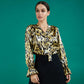 divacatwalk ricky long sleeve animal printed top with a  loose tie detail at the front in gold leopard print front