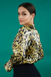 divacatwalk ricky long sleeve animal printed top with a  loose tie detail at the front in gold leopard print back
