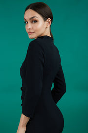 model is wearing diva catwalk plaza sheath dress with high neck Trapezium neckline cutout and three quarter sleeve pretty dress in black side