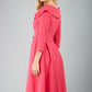 model is wearing diva catwalk gatsby swing dress with pocket detail and wide v-neck collar and buttons down the front panel in pink side back