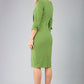 blonde model is wearing diva catwalk logan round neck sleeved pencil dress with side arrow pleating detail in citrus green back