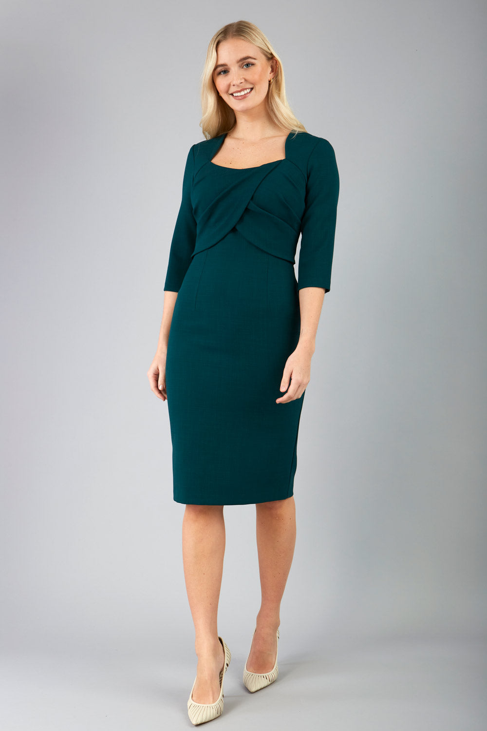 Model wearing Diva Catwalk Lantana Square Neck Pencil Dress 3/4 Sleeve in Forest Green front