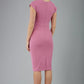 model is wearing diva catwalk Ester cap sleeve pencil dress with v-neck and bow detail at the front in cashmere pink back