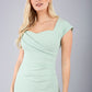 blonde model is wearing diva catwalk stella sweetheart neckline cap sleeve pencil dress in deco green front
