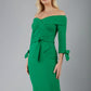 blonde model is wearing diva catwalk mulberry pencil off-shoulder dress with a bow detail on 3/4 sleeves and criss cross on a front panel in emerald green front