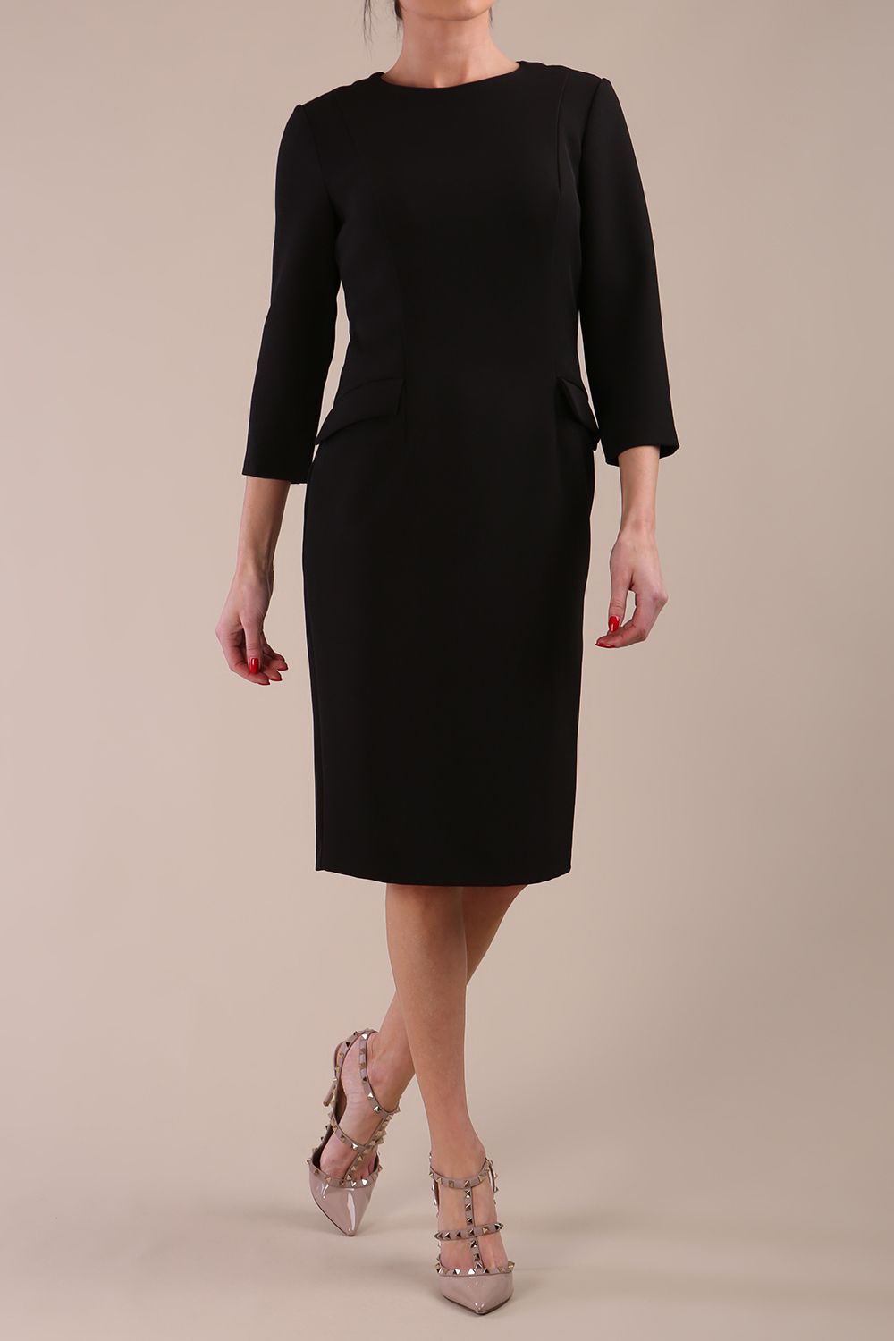 Model wearing diva catwalk Elsinor 3/4 Sleeve pencil skirt dress with two side pockets front  in Black