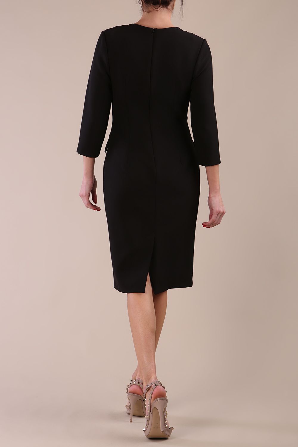 Model wearing back diva catwalk Elsinor 3/4 Sleeve pencil skirt dress with two side pockets in Black 