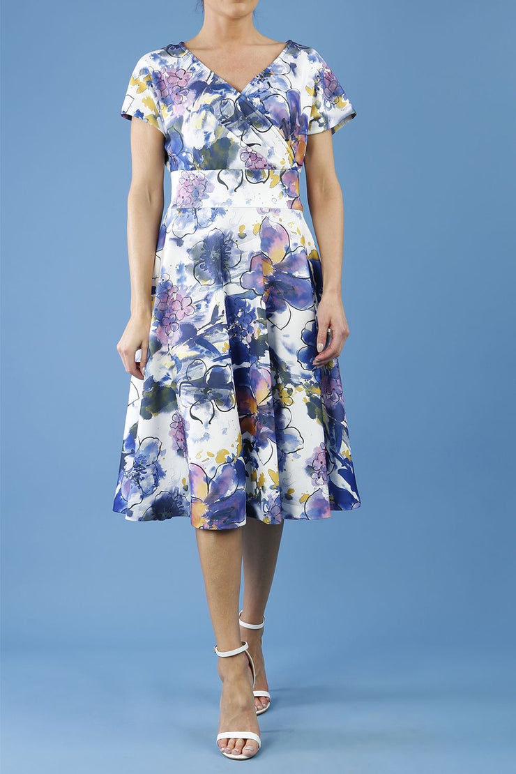 blonde model is wearing diva catwalk boston short sleeve v-neckline a-line swing dress in abstract hibiscus print front