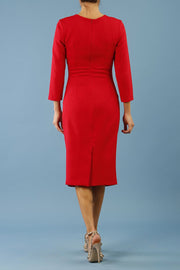 model is wearing diva catwalk miracle pencil dress with keyhole detail on a side of the front panel and gathering detail on a side or bodice panel with sleeves in scarlet red colour back