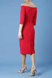 model is wearing diva catwalk lauren odd shoulder asymmetric neckline pencil dress with sleeves in scarlet red back