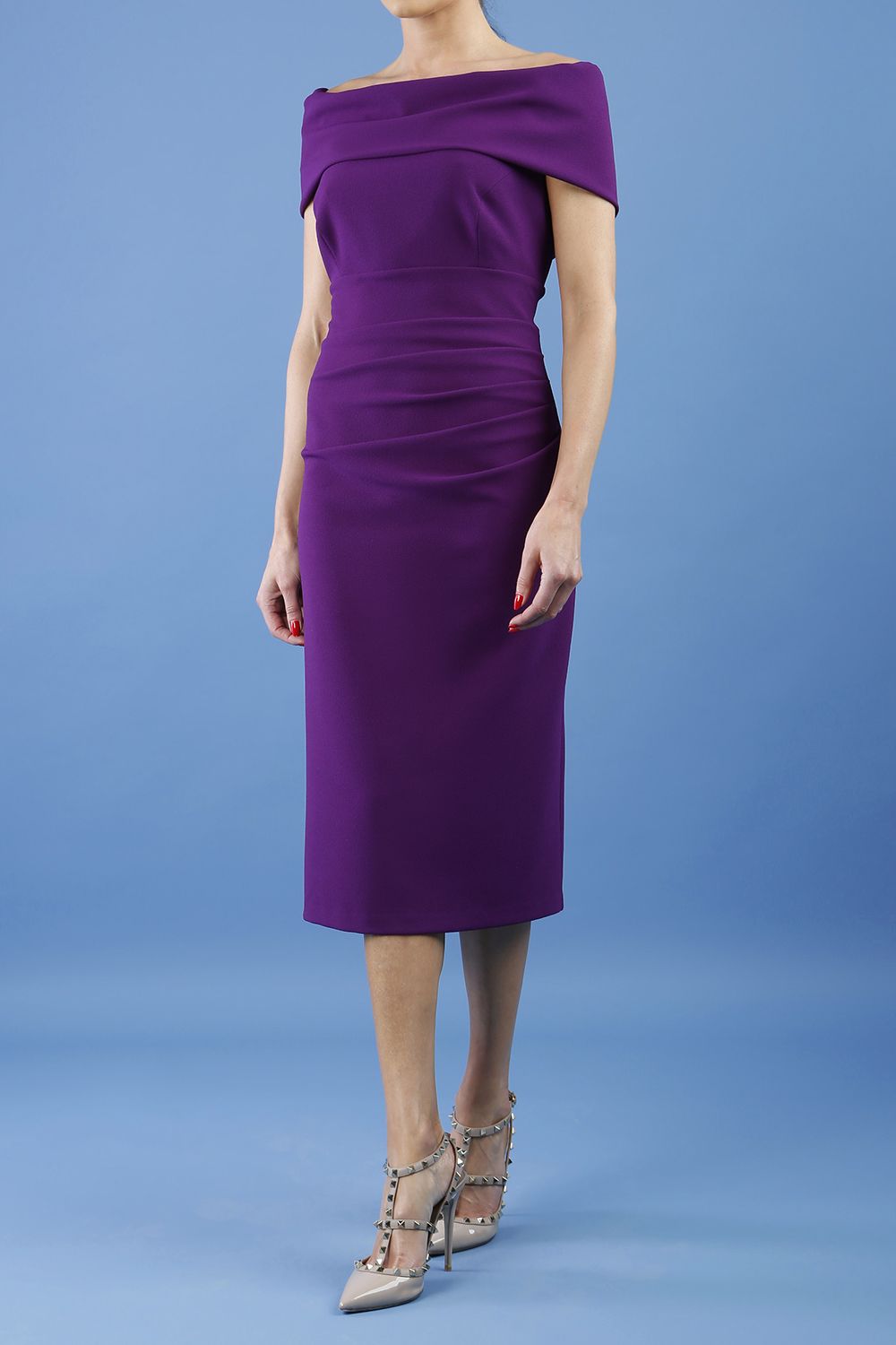 model is wearing diva catwalk amelia pencil dress with bardot neckline and ruched back in passion purple front